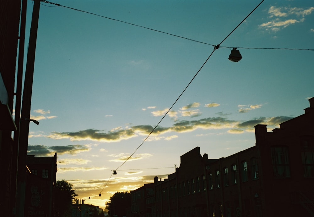 black street light under blue sky during daytime