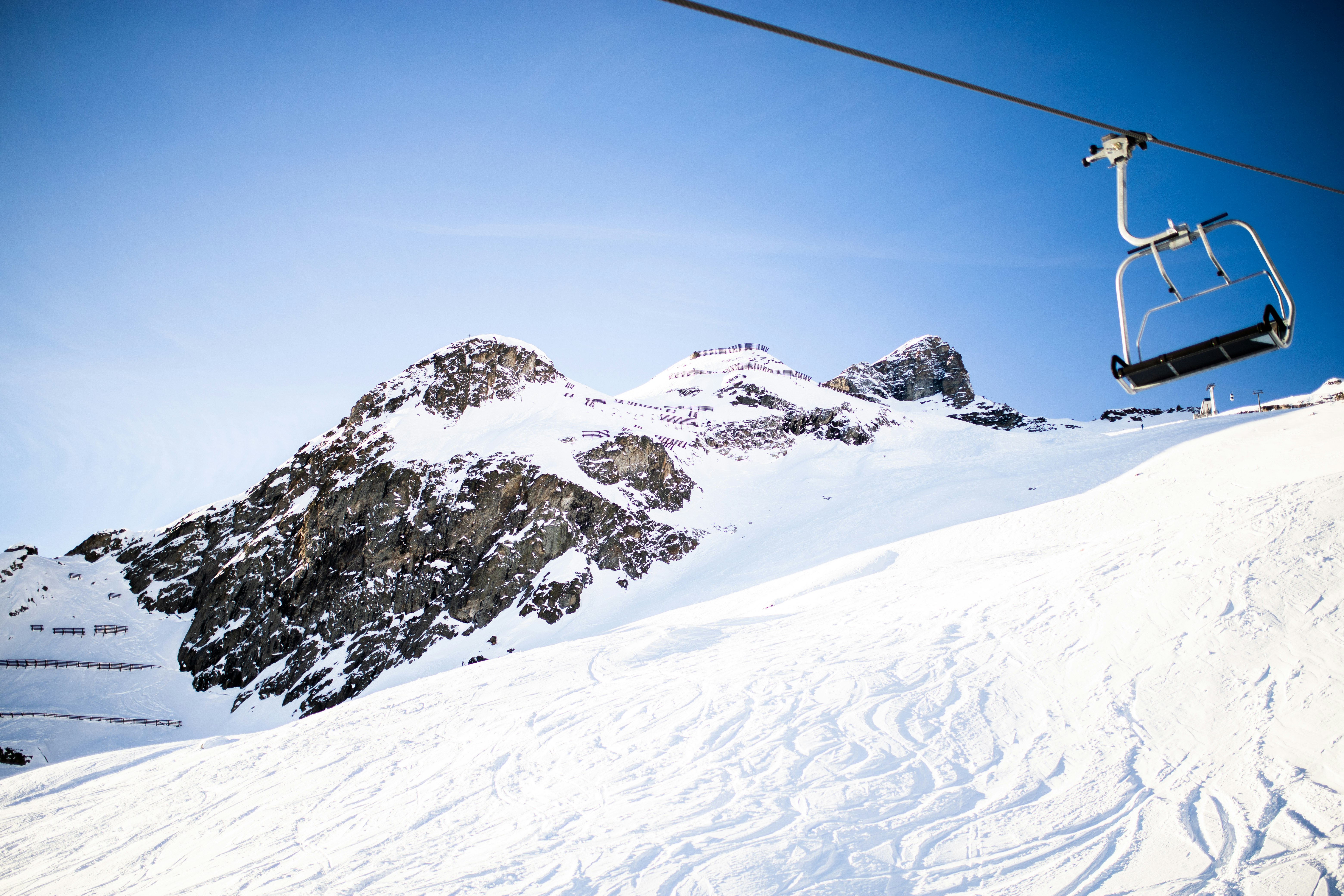 snow covered mountain under blue sky during daytime