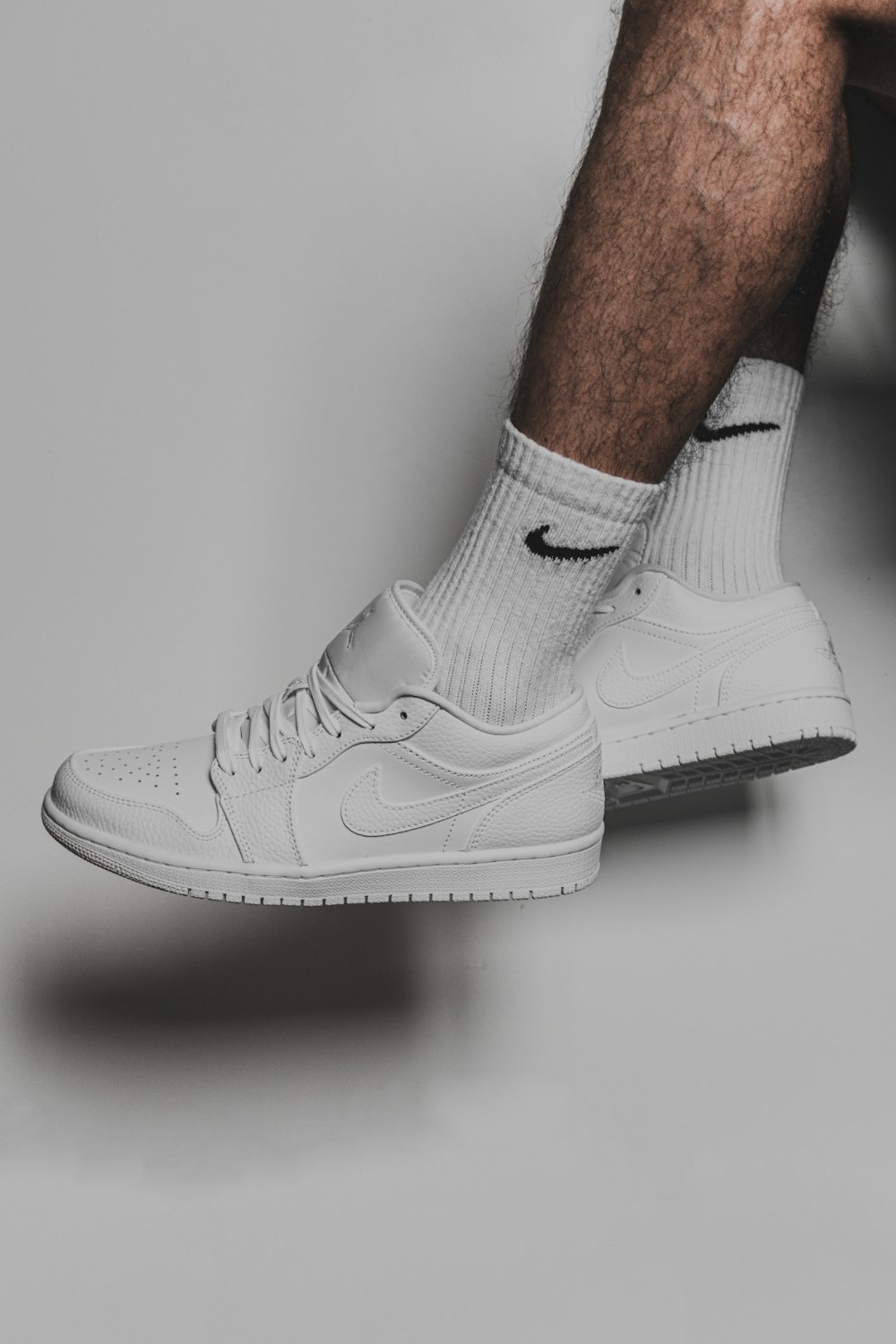 person wearing white nike air force 1 low photo – Free Style Image on  Unsplash