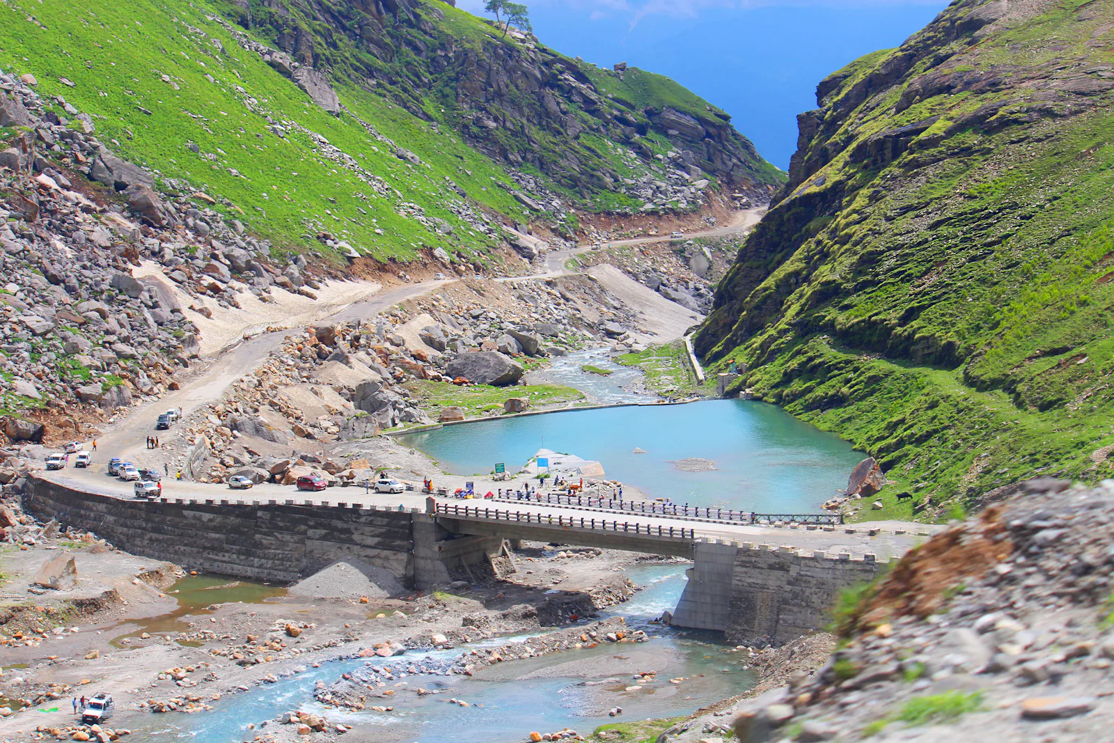 Bridge over a turquoise river on the Manali–Leh highway