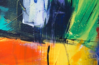 Colorful abstract painting with bold strokes and textured layers on canvas