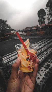 Close-up of swirling nitrogen fog rising from a freshly made ice cream cup.