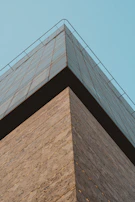 Detail of architectural elements: sharp angles and refined materials in a premium residential project.