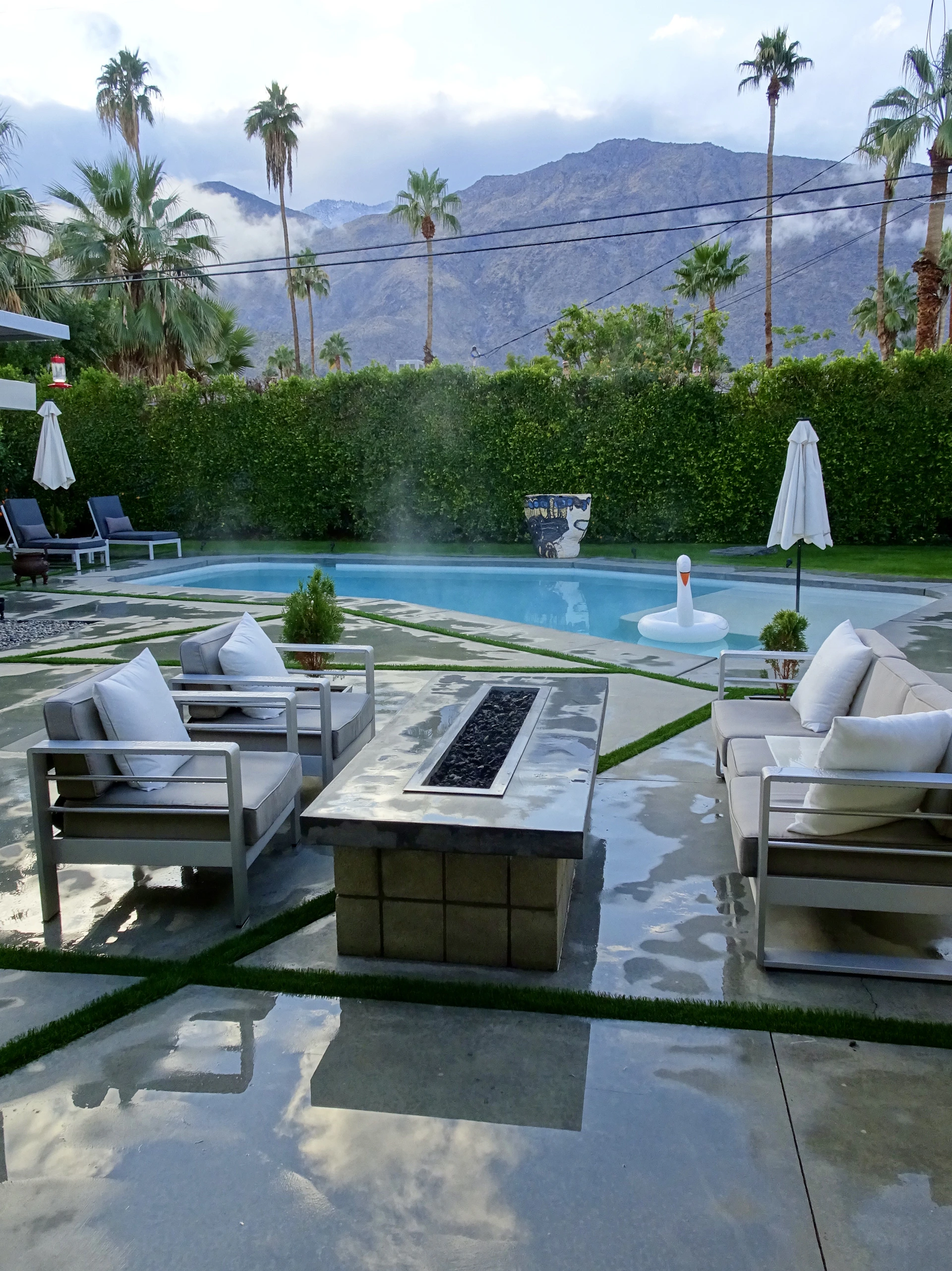 woman wearing yellow long-sleeved dress under white clouds and blue sky during daytime