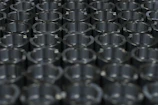 Rows of neatly organized metal parts freshly machined, highlighting uniformity and quality control.