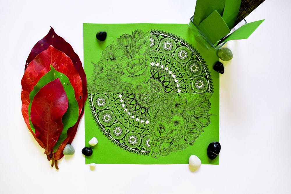 green and red floral textile