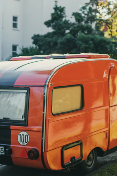orange and blue van on road during daytime