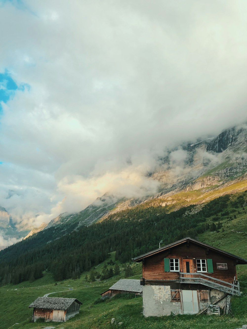 brown wooden house on top of mountain