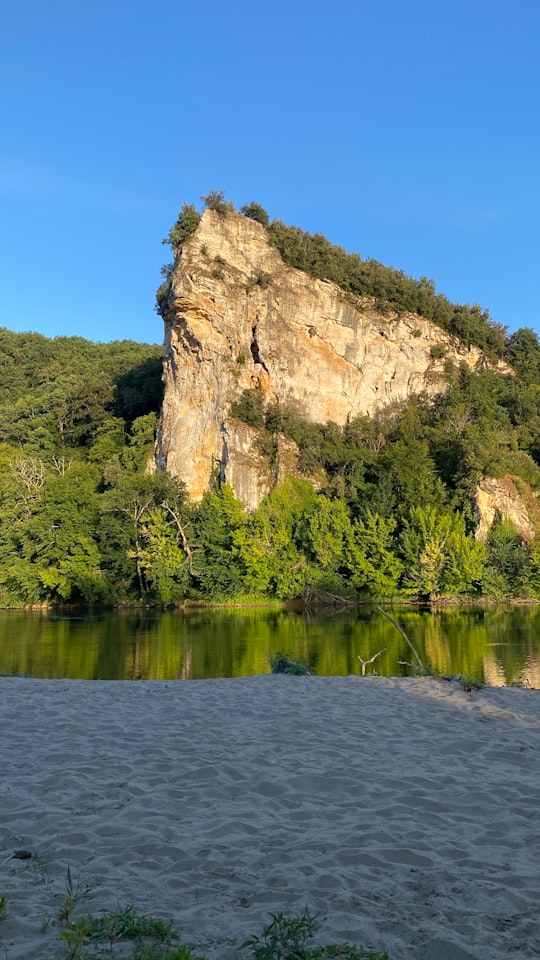 green trees beside body of water during daytime in The Plein Air des Bories France