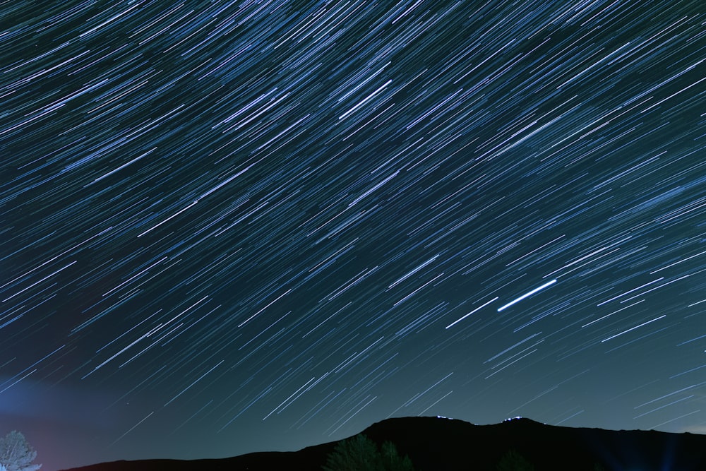 time lapse photography of stars during night time