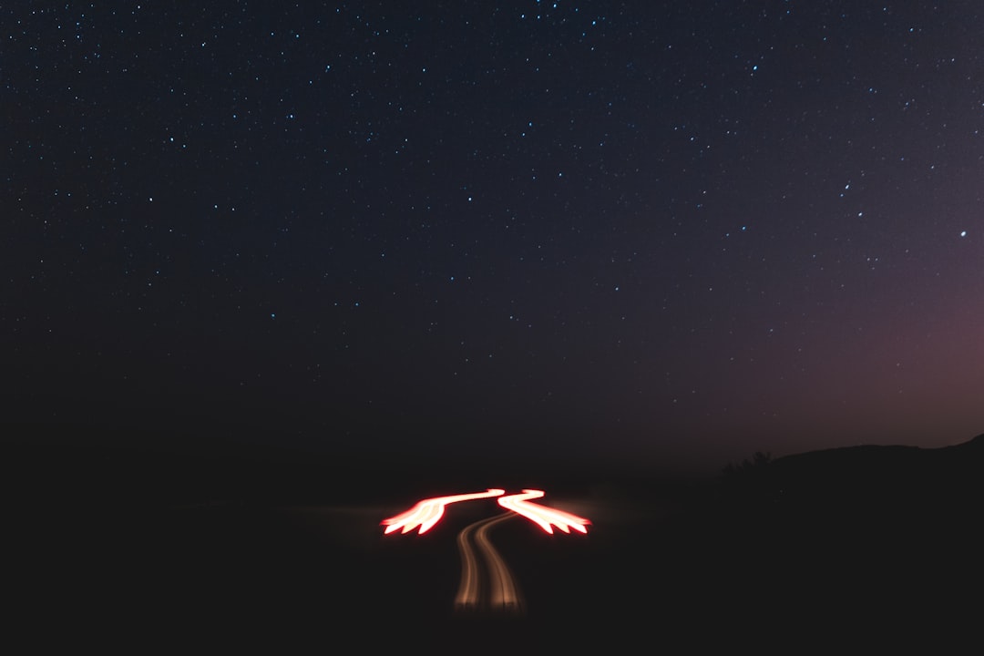 person doing fire dance during night time