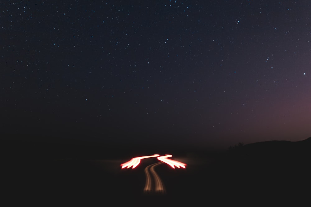 person doing fire dance during night time