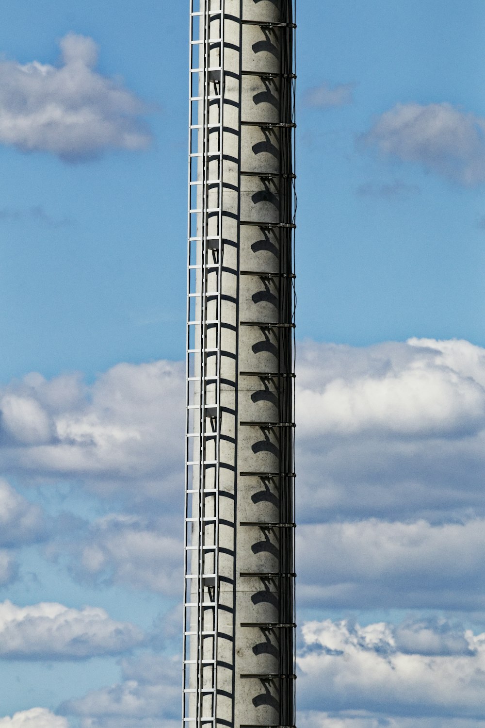 black and white tower under blue sky