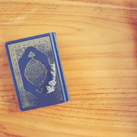 An elegant personalized agenda with soft lavender cover and gold lettering.
