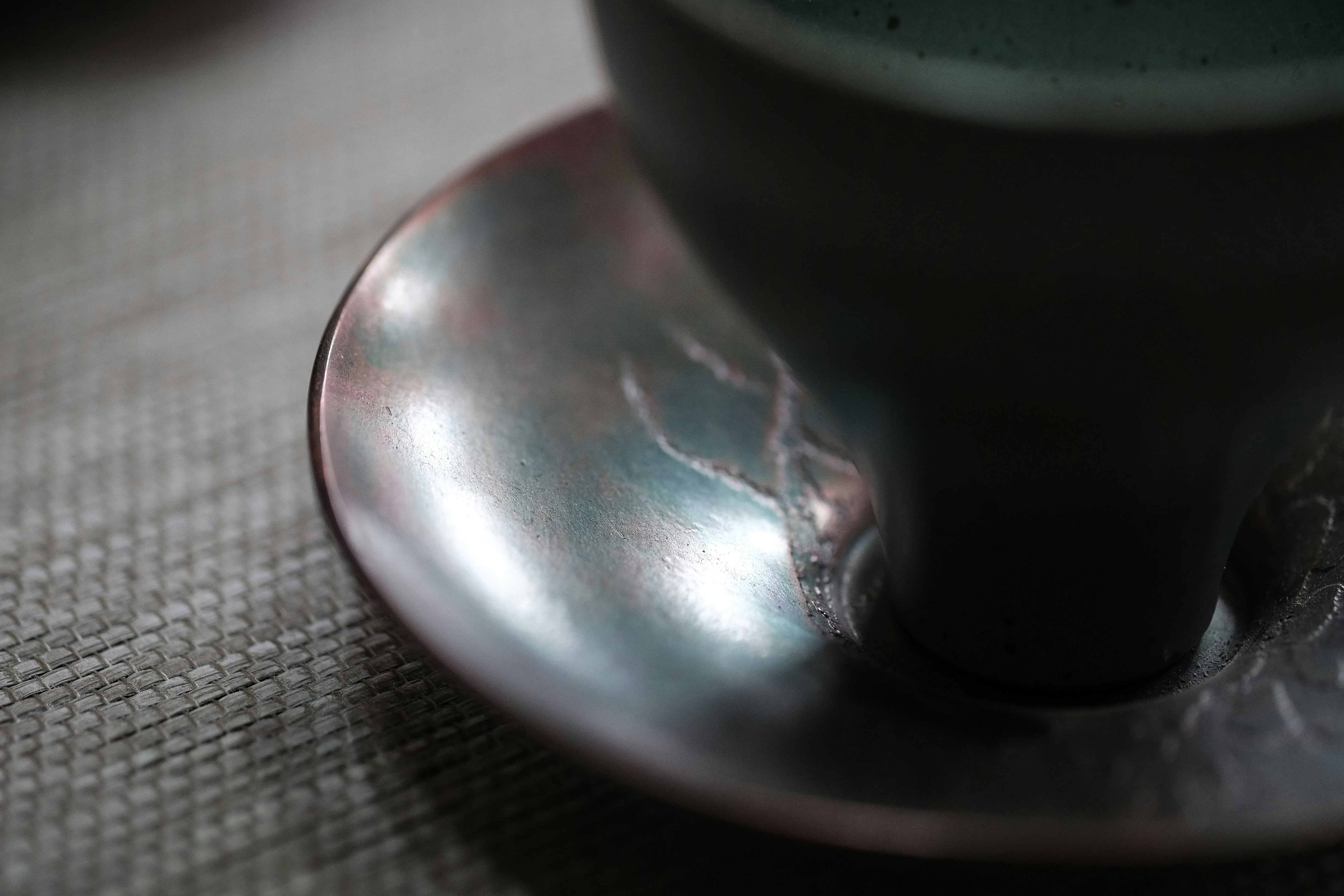 black ceramic cup on saucer