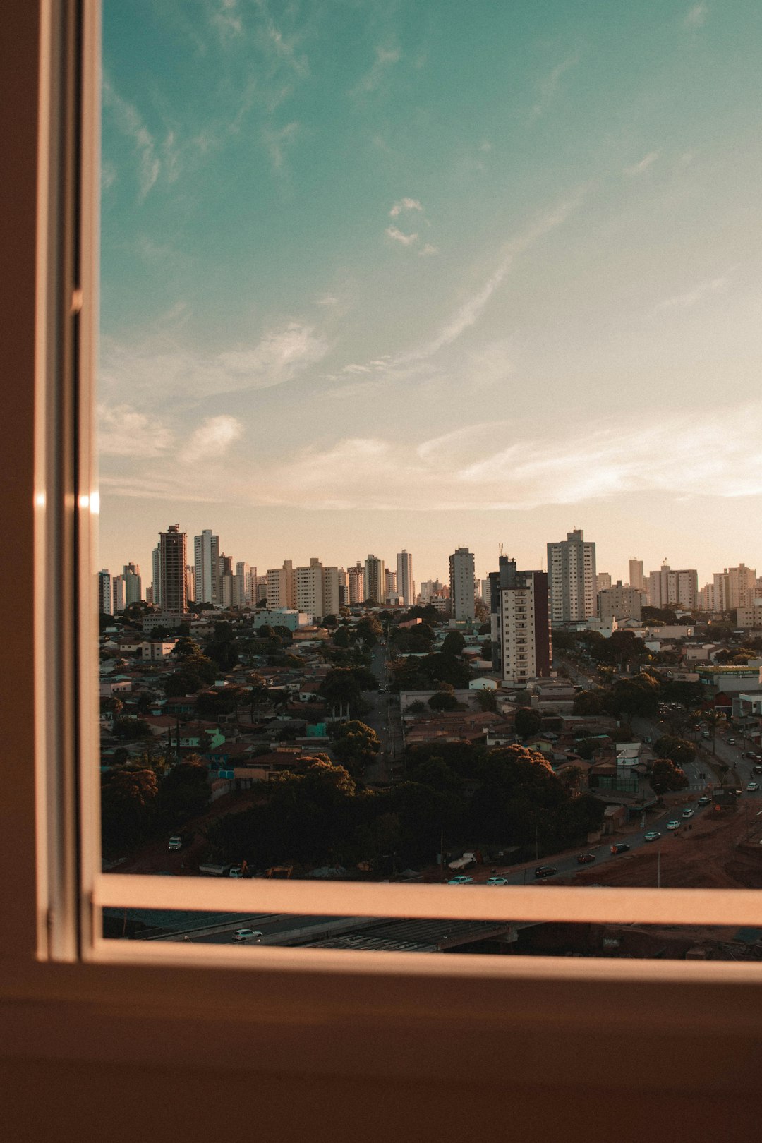 city skyline under blue sky during daytime in Goiânia Brasil