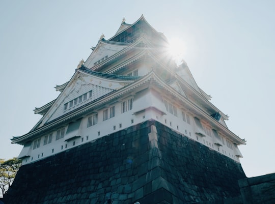 white and black concrete building in Osaka Castle Park Japan