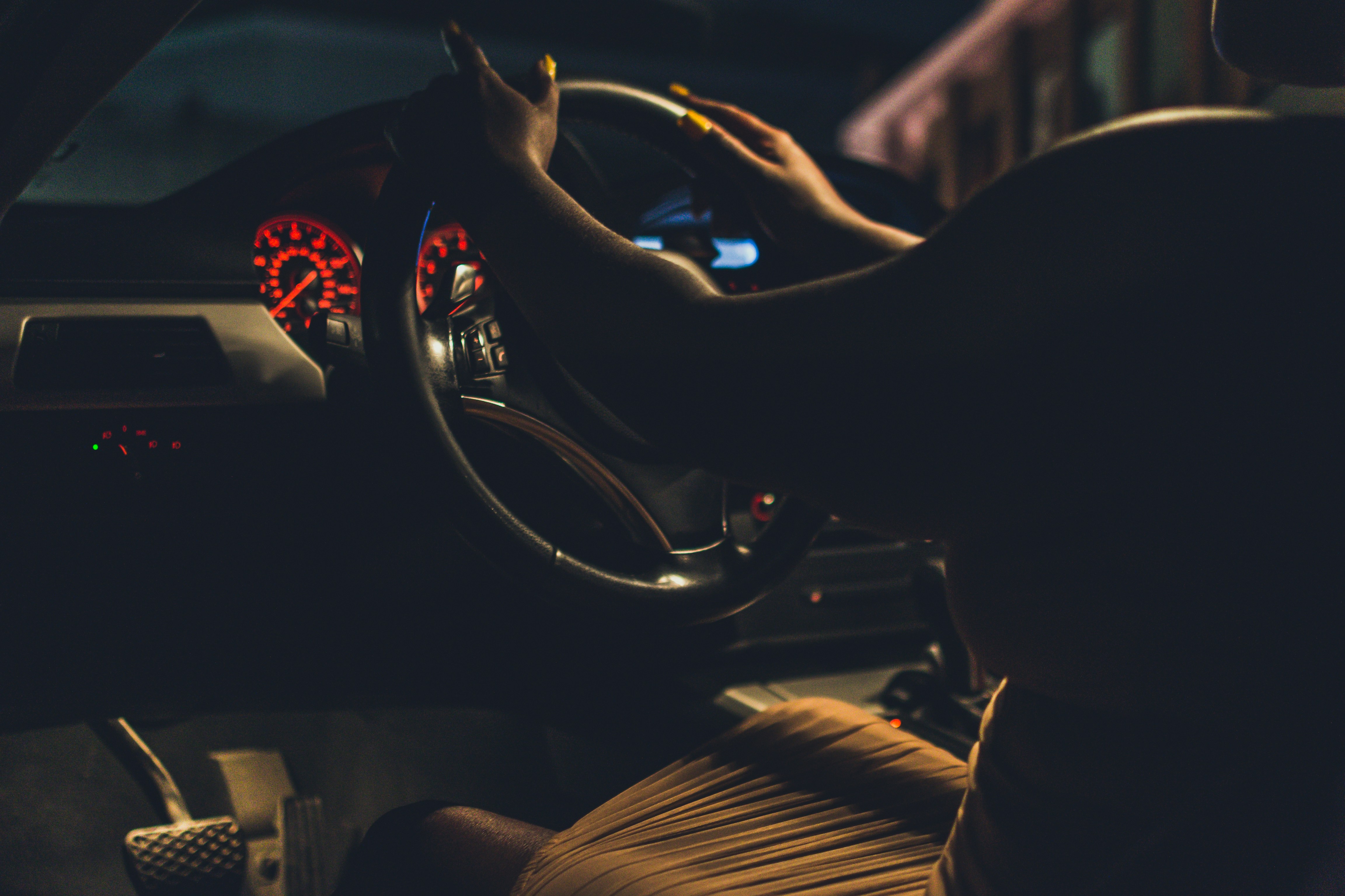 person driving car during night time