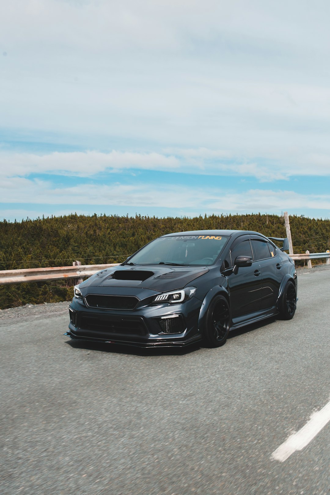 black bmw m 3 on road during daytime