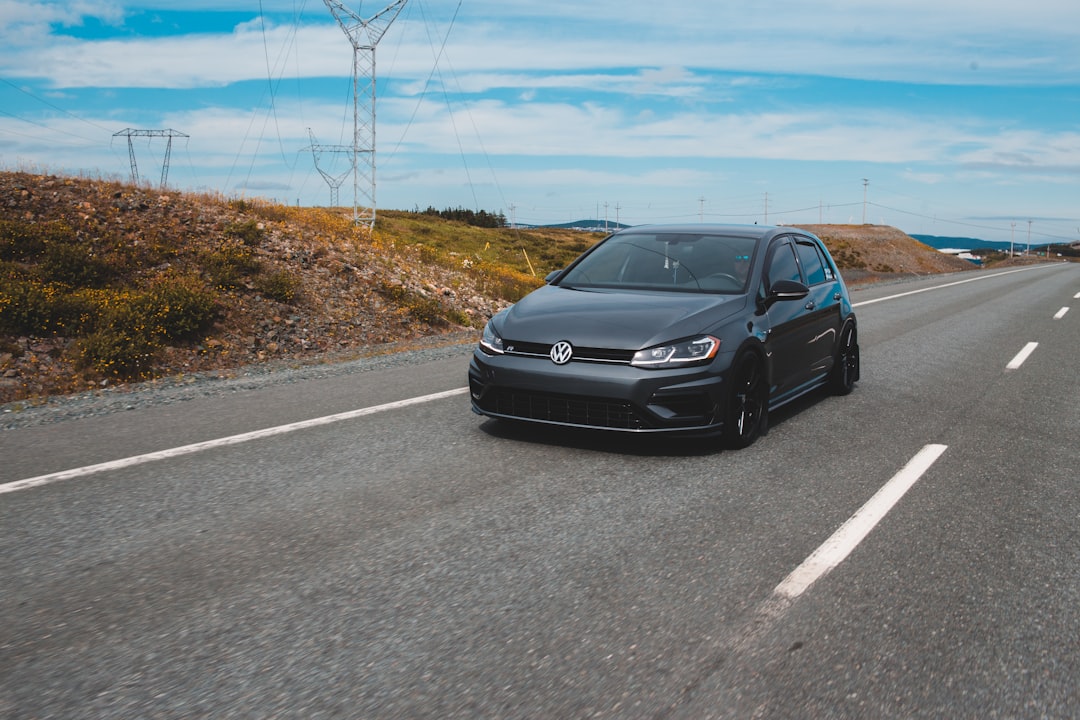 black mercedes benz c class on road during daytime