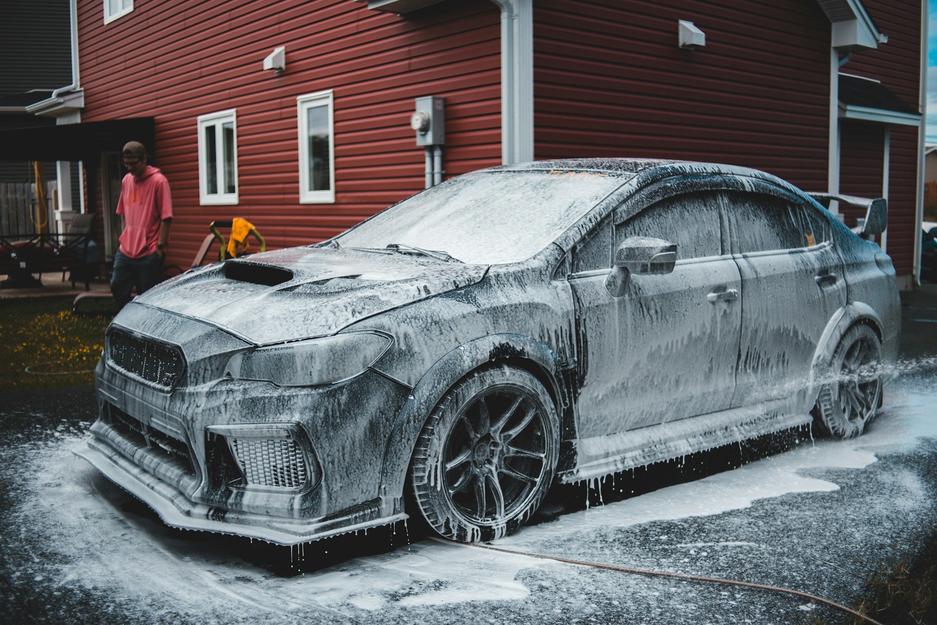 black bmw coupe on snow covered ground