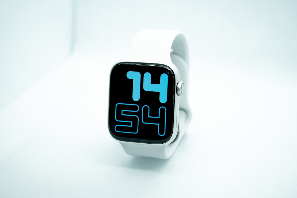 white and black digital watch