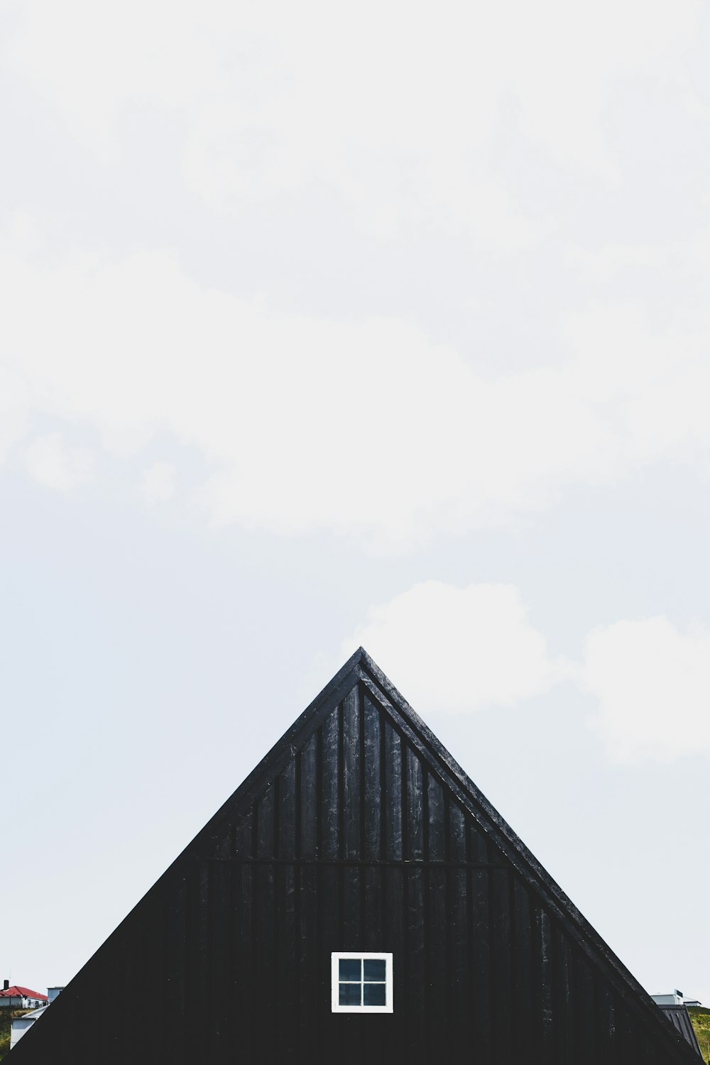black wooden house under white sky