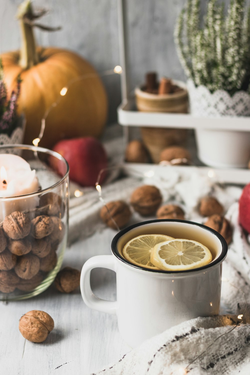 white ceramic mug with yellow liquid inside