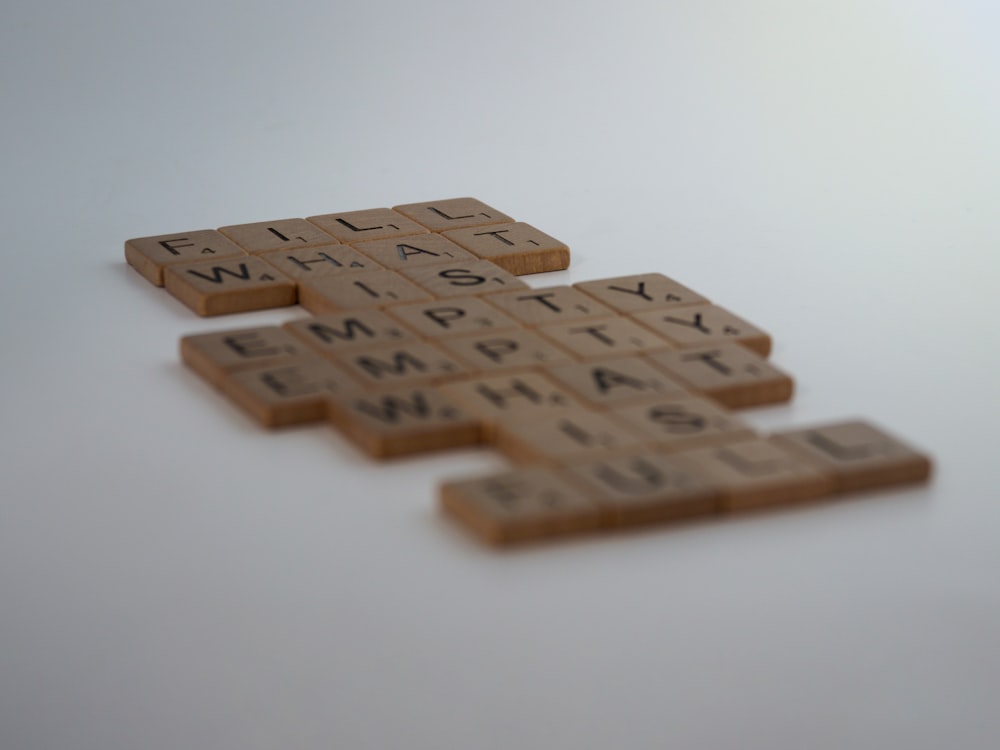 brown wooden blocks on white table