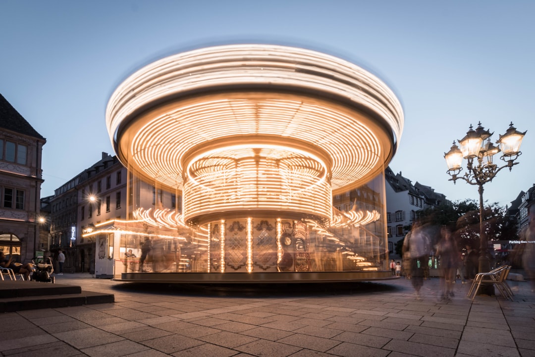 time lapse photography of lighted carousel during night time