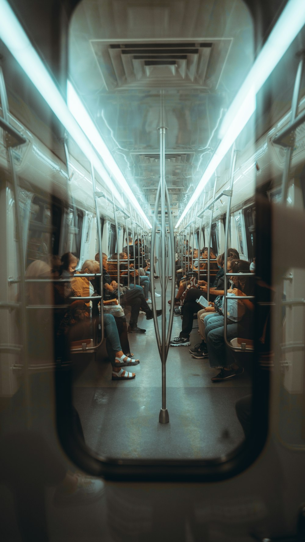 people sitting inside train during daytime