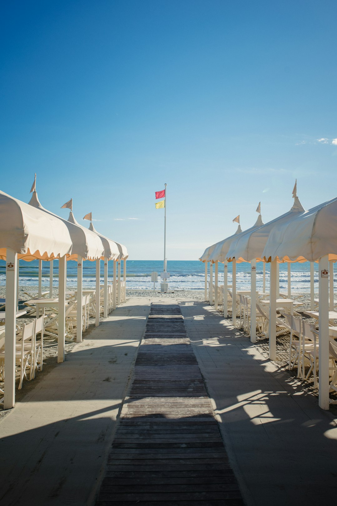 white and brown canopy tent on beach during daytime