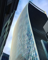 black and white glass walled high rise building
