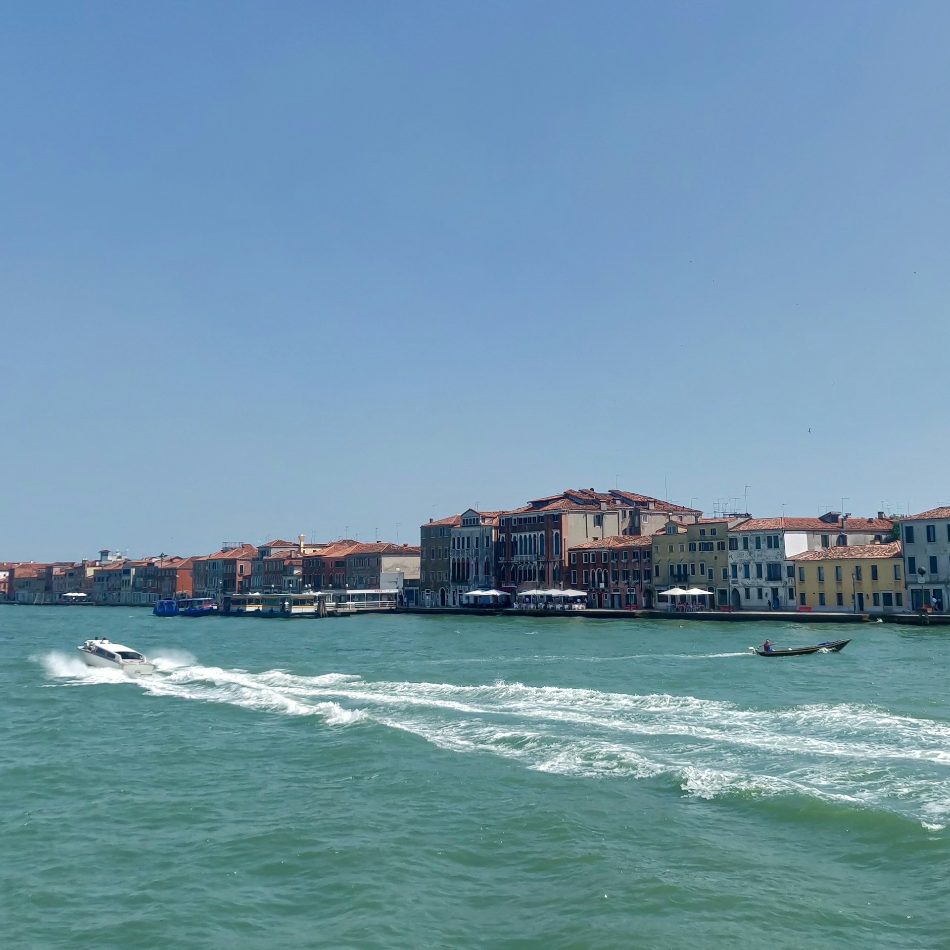 woman wearing yellow long-sleeved dress under white clouds and blue sky during daytime