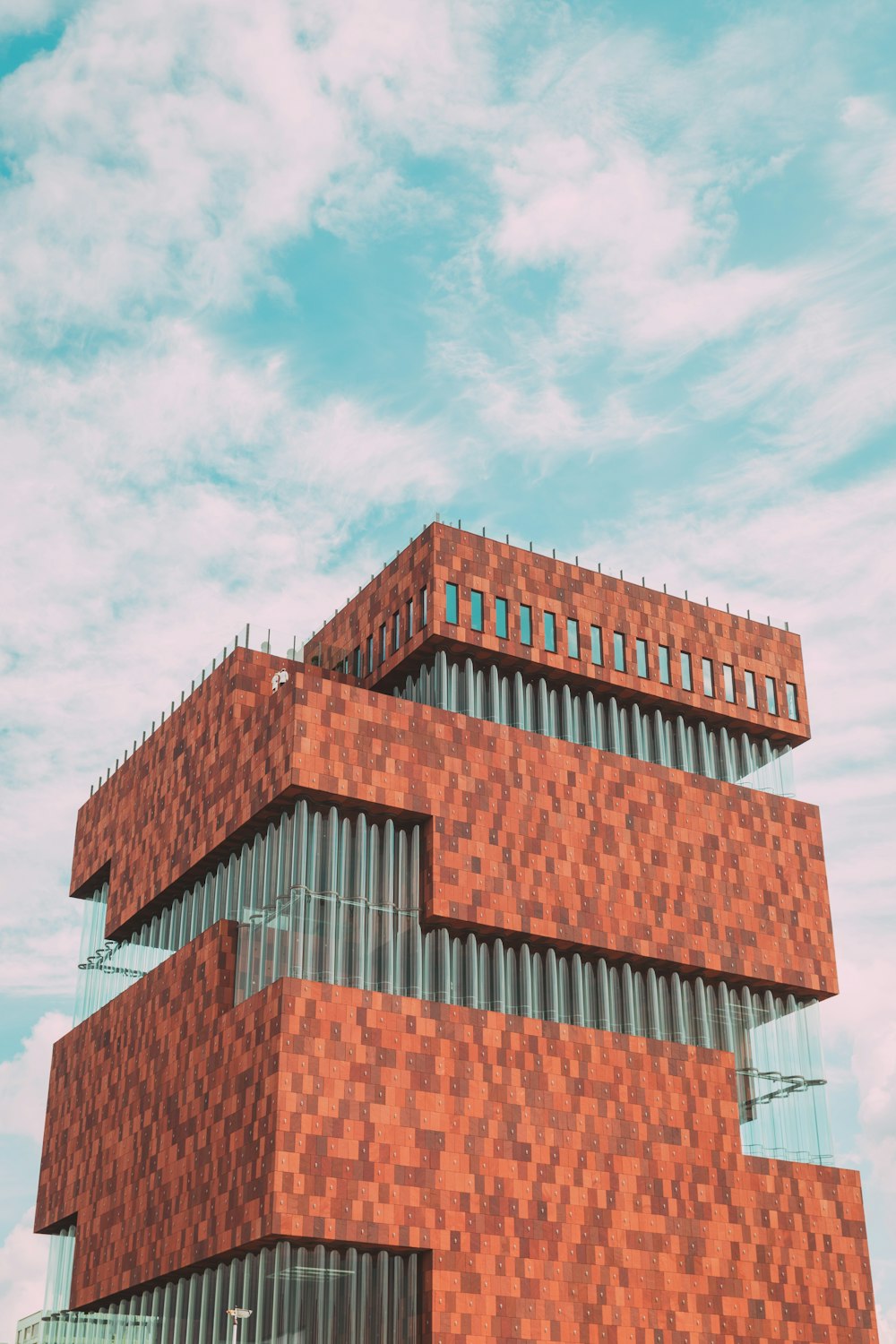 brown concrete building under blue sky during daytime