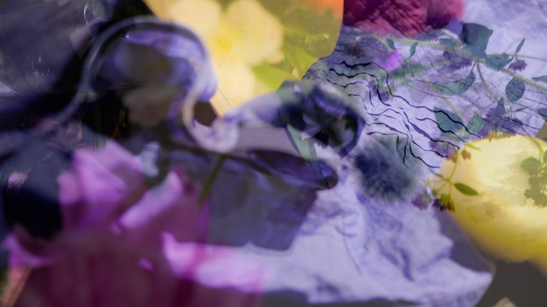 Abstract flowers and fabric. The picture is taken with double exposure.