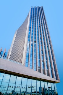 gray concrete building under blue sky during daytime