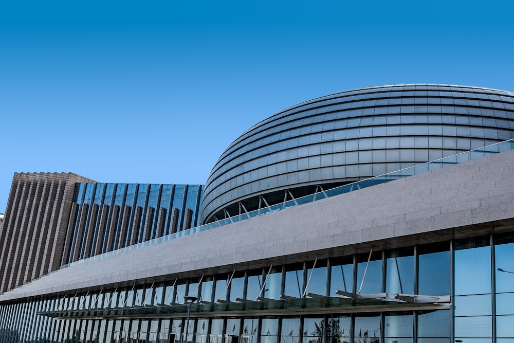 gray concrete building under blue sky during daytime