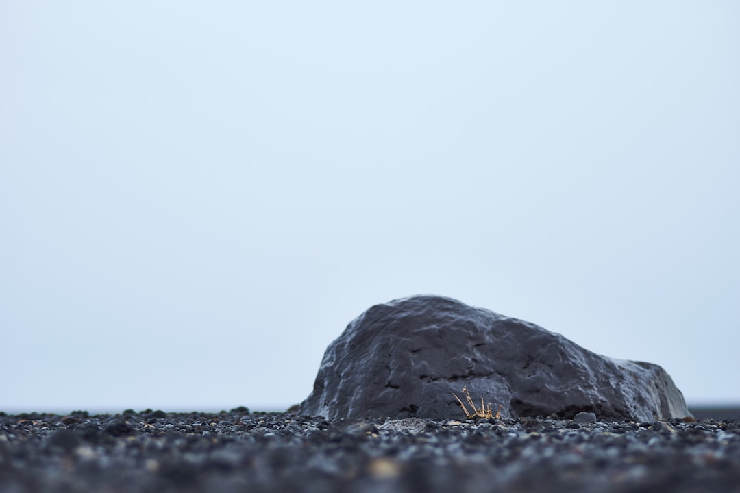 black rock on black and white surface