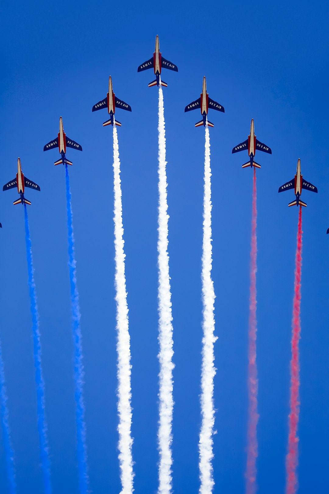 eight fighter planes in mid air