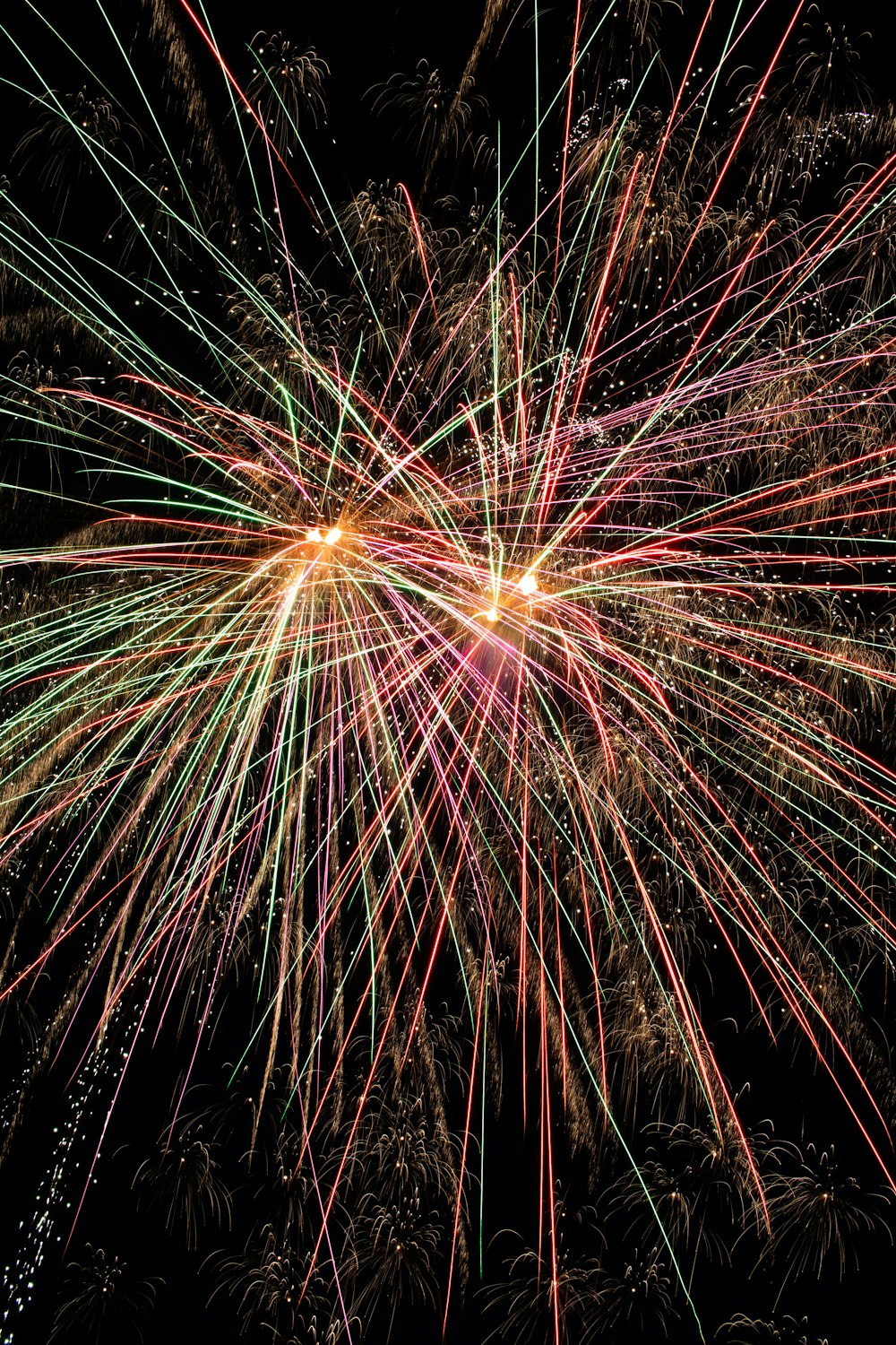 yellow and red fireworks during nighttime