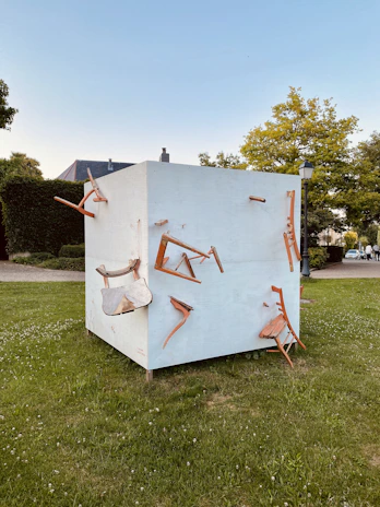 An outdoor scene with cube's durable goods packed for a day of modern, minimalist adventure.