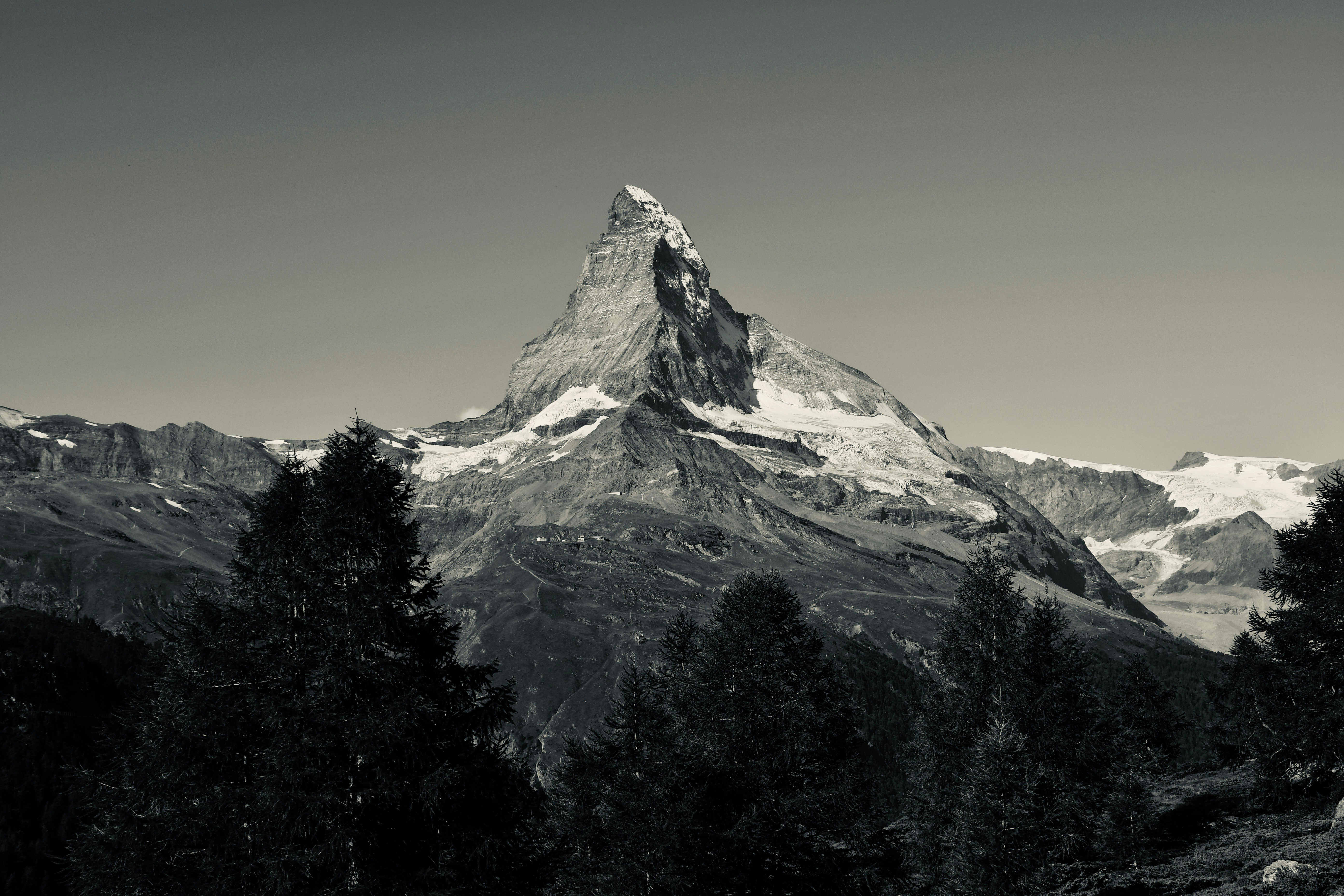 snow covered mountain during daytime