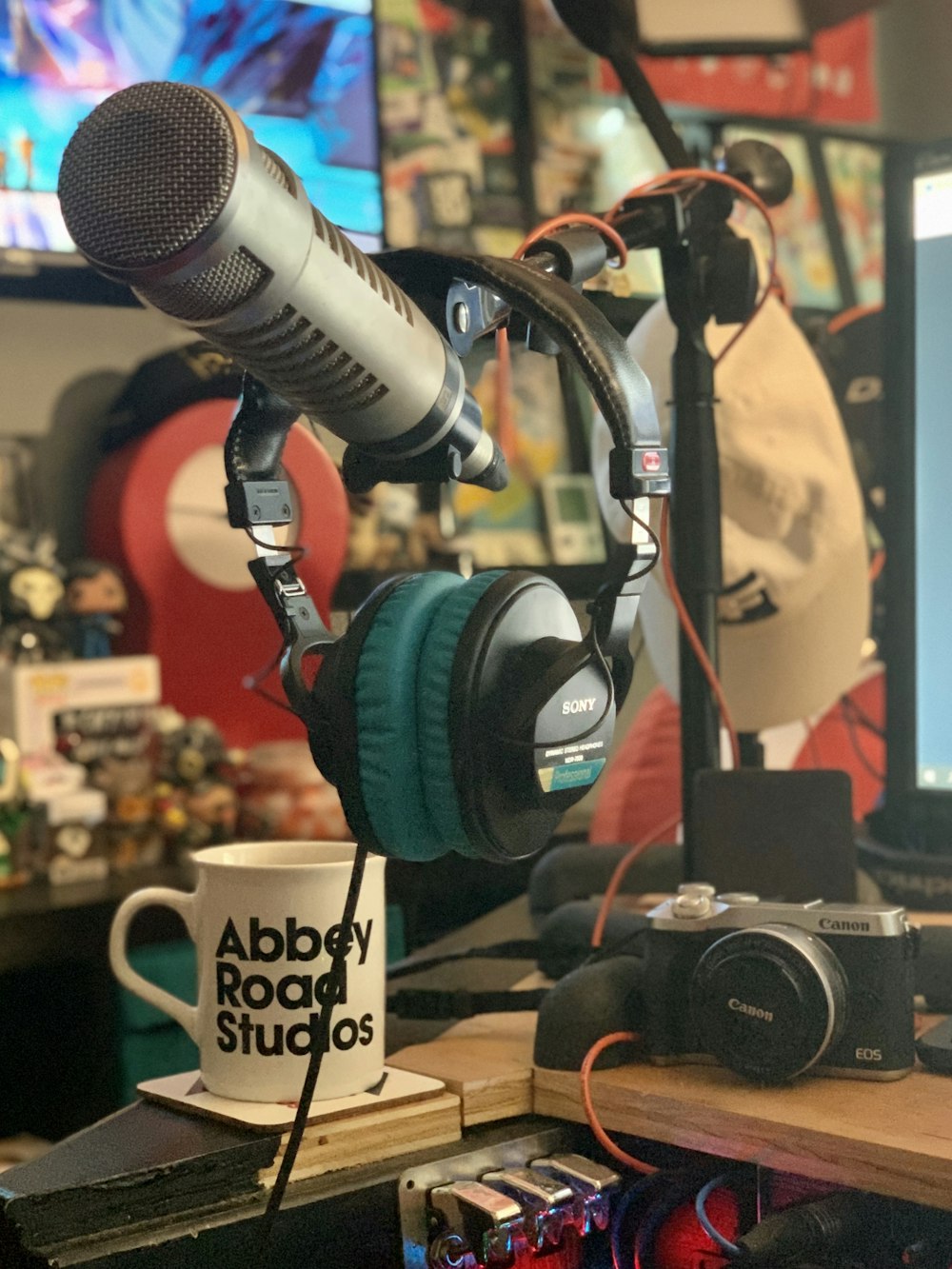 black and blue headphones beside black headphones