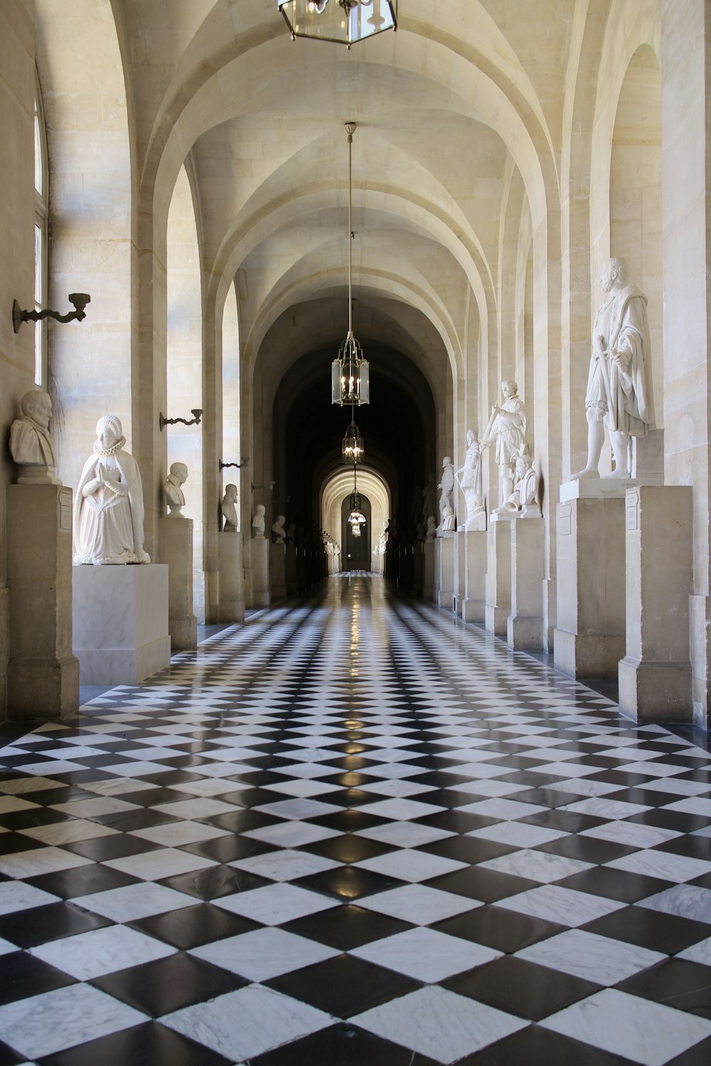 white and blue tiled hallway