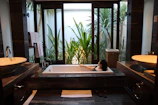 A beautifully renovated bathroom with modern fixtures and a large soaking tub.