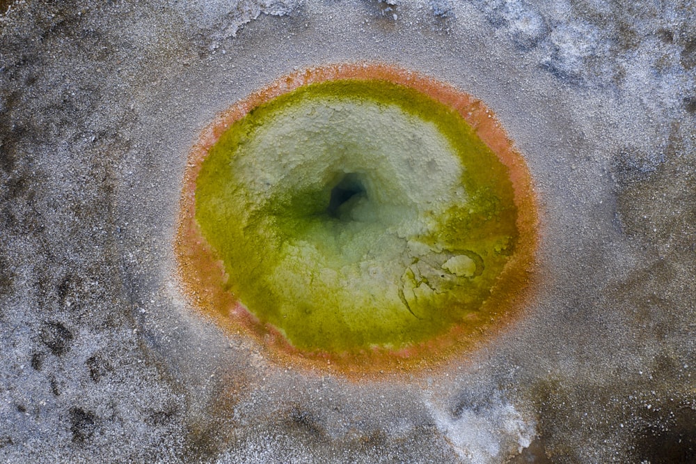 green apple on gray sand