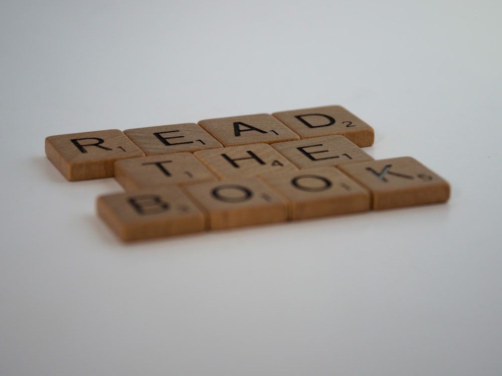 brown wooden letter t-letter