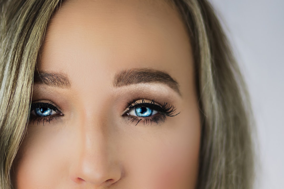 woman with blue eyes and brown hair