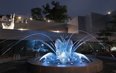 Elegant electronic water fountain for cats with LED lighting.